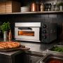 Four à pizza installé dans une cuisine professionnelle