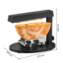 Appareil à raclette professionnel noir, équipé d'une résistance chauffante horizontale au-dessus d'une demi-meule de fromage. Su